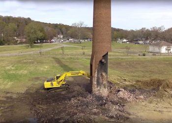 This Excavator Was Toppling An Old Smokestack When Suddenly The Unthinkable Happened