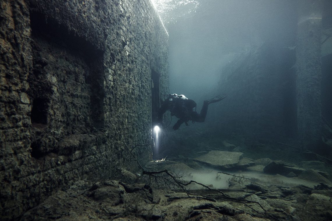 Divers Explored This Infamous Flooded Prison And Discovered A Dark History Hidden Within Its Wall